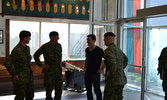 Greeting Andrew Ference at the Regiment, Major Chris Nolan, Master Warrant Officer Iain Fox, and Corporal Calvin Delisle.