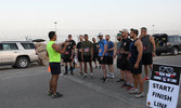 JTF-I and ATF-I members prepare to begin the RCAF run at Camp Canada, AASAB, on 18 Jun 22.
