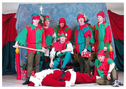 Cpl Travis Silcox (Santa) Lt Matthew Hoffart (On ground), Lt Shaun Rogozinski (In Chair), Left to Right = Lt’s Justin Rice, Bryce Simpson, Andrew Tardiff, Joseph Monroe & David Wright

After a long day of traditional elf-work, some of Santa's little helpers were feeling somewhat mutinous.
