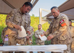 Captain Kai Keewatin demonstrates a Smudge Ceremony to JTF-I pers at AASAB, Kuwait, 30 September 2022