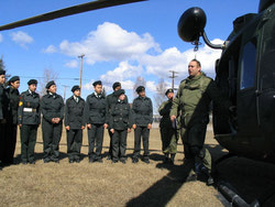 2860 Cadets listen to the safety briefing before the flight.